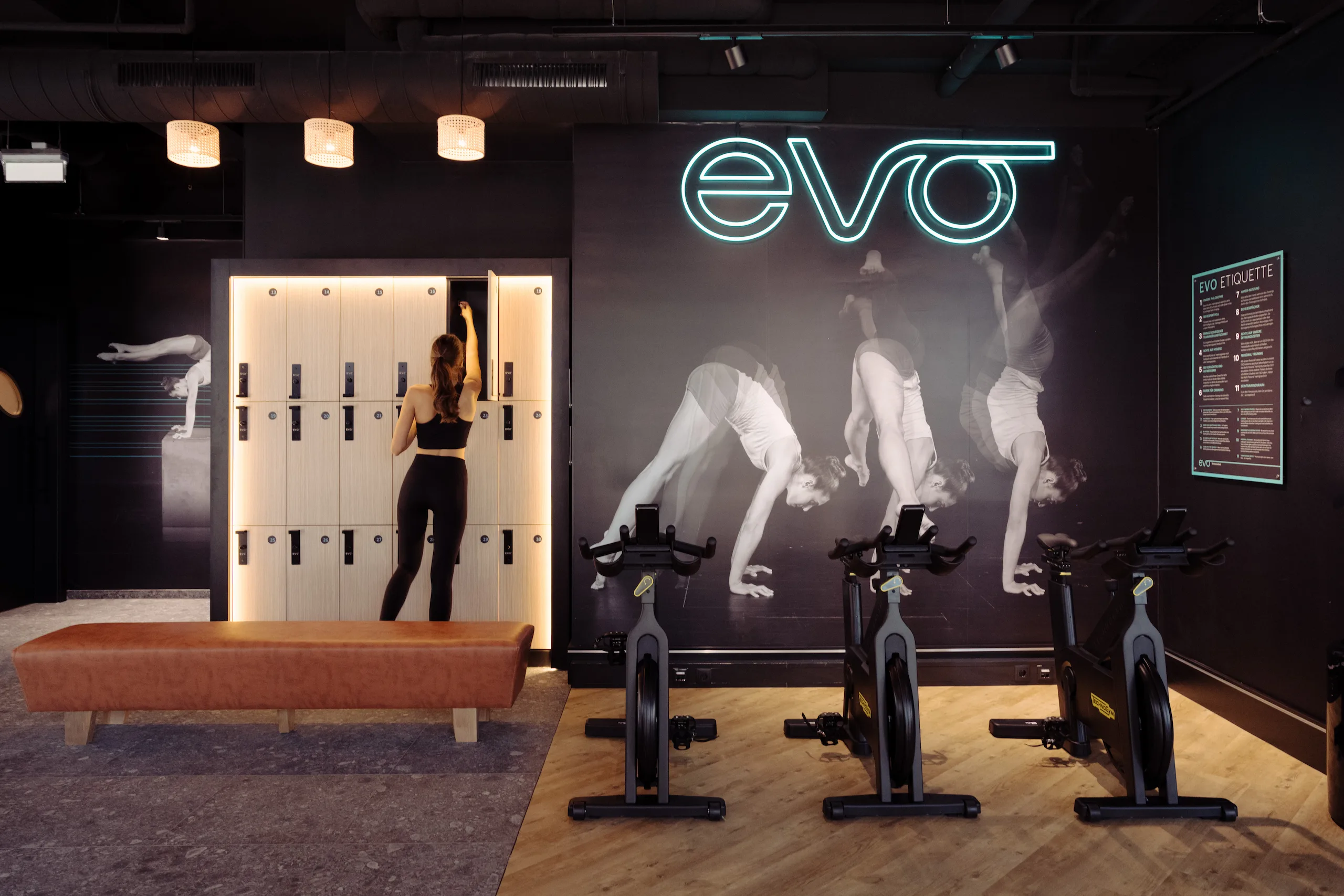 Locker area and stationary bikes at EVO Fitness