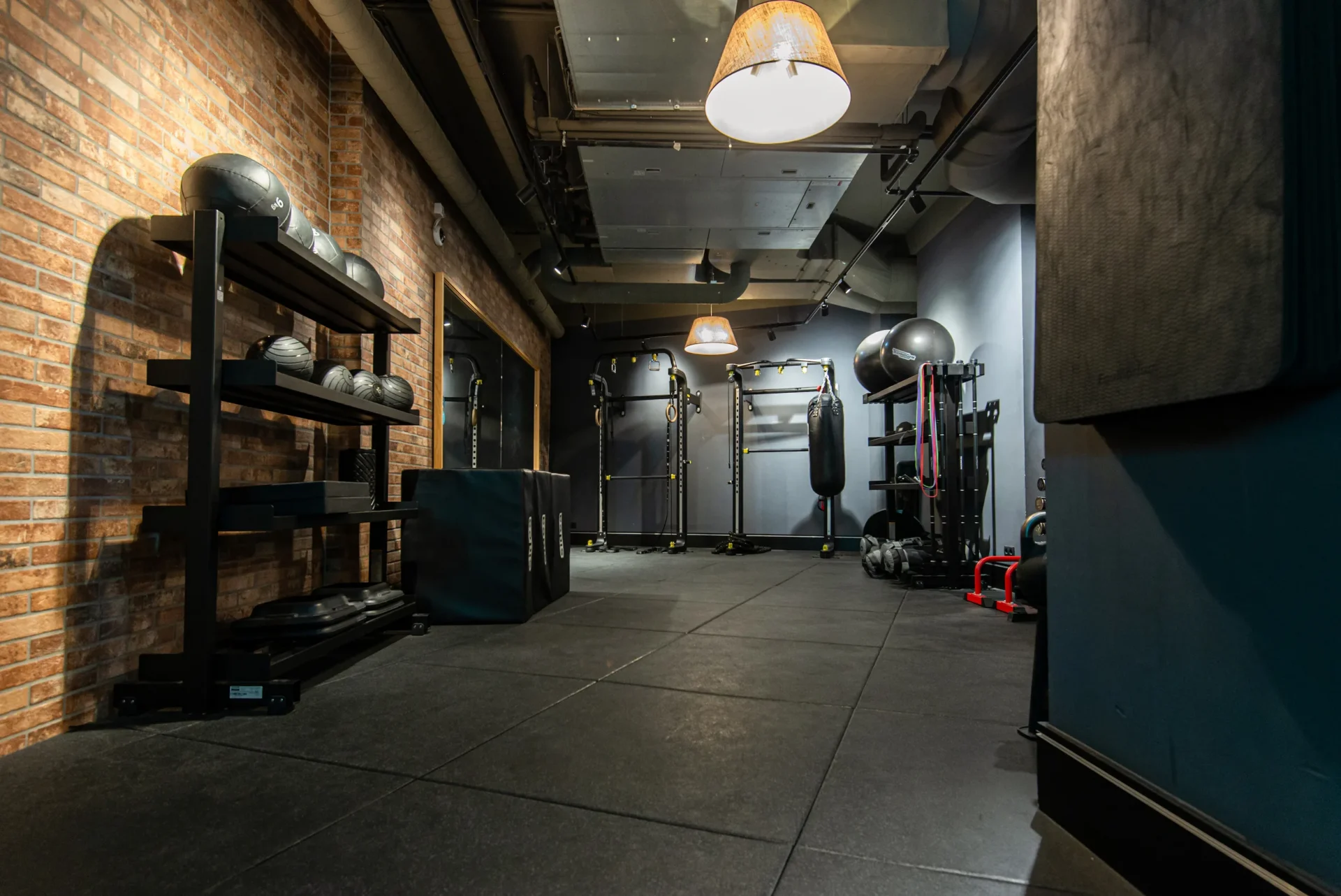 EVO Fitness Schleifmühlgasse functional training space with wall balls and boxing bag