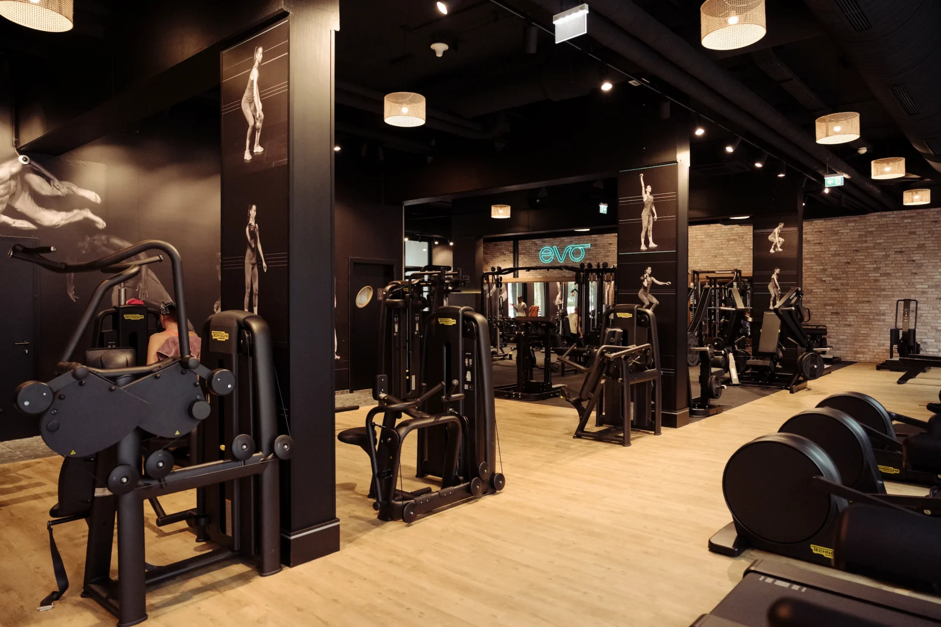 Panoramic view of EVO gym with various strength machines